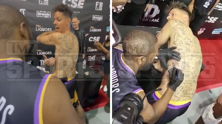 Floyd Mayweather Tattoos His Signature on Back of Funky Matas